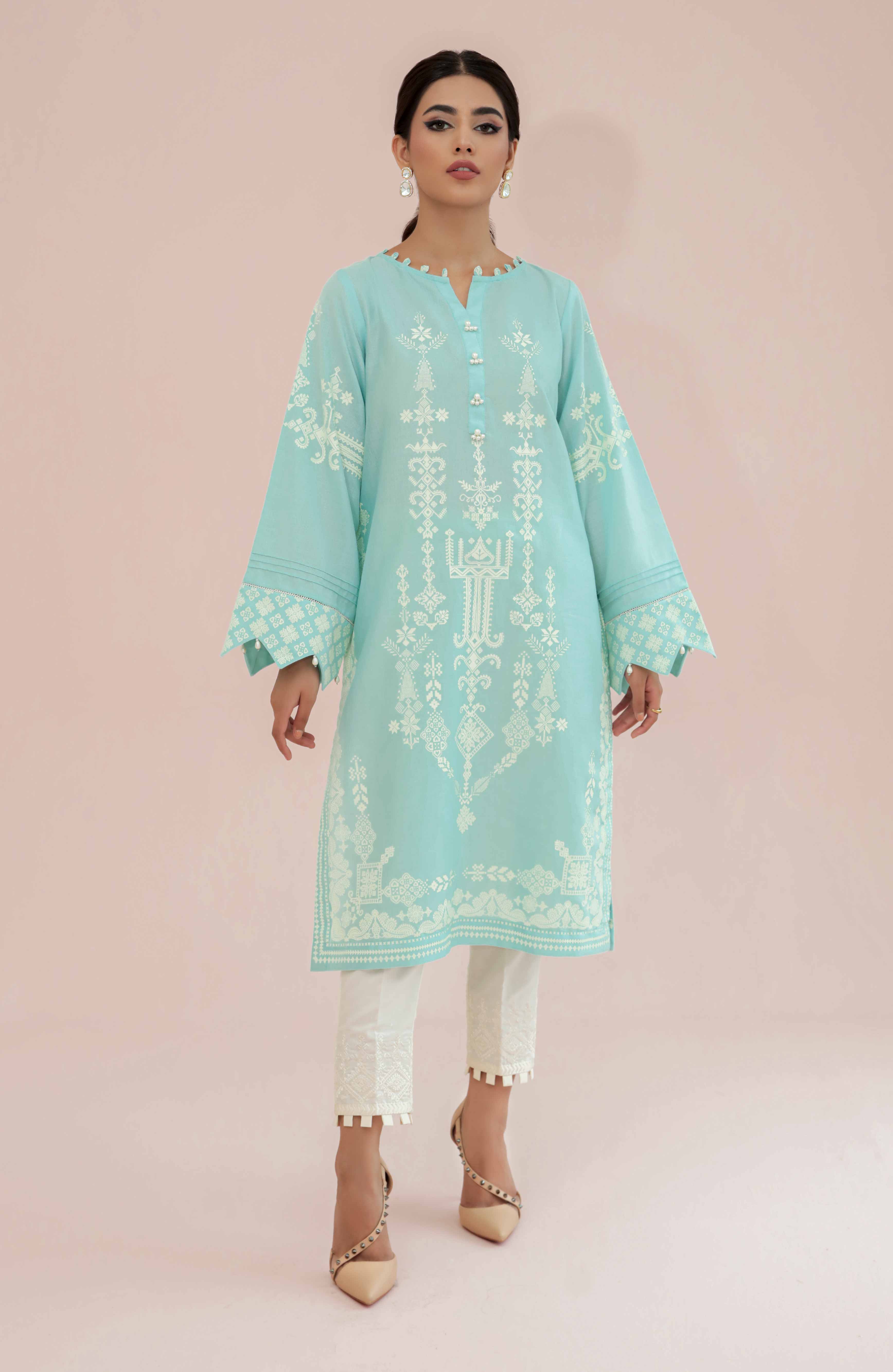 A Girl Wearing Trending Lawn Ready To Wear Pret In Aqua Color